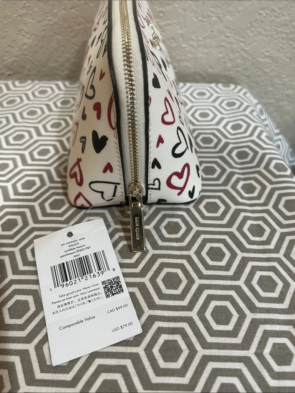 kate spade White Cosmetic Pouch with Red & Black Heart Print